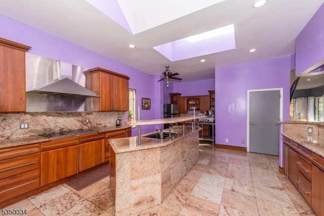 155 Route560, Sandyston Twp, NJ 07851 - kitchen featuring wall chimney range hood, a skylight, recessed lighting, black electric cooktop, and a sink