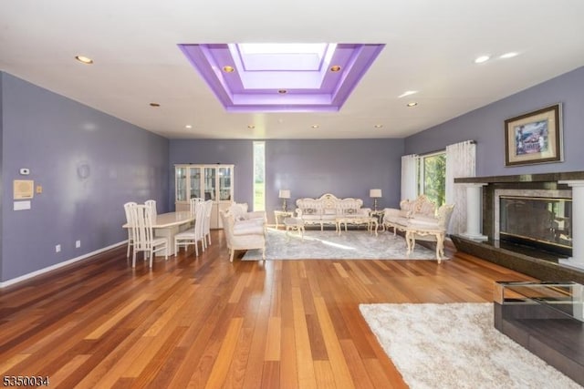 155 Route560, Sandyston Twp, NJ 07851 - living room with wood finished floors, a premium fireplace, a skylight, and recessed lighting