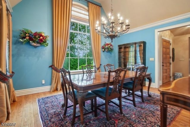 9 Valley View Dr, Lebanon Twp, NJ 07830 - dining room featuring a chandelier, vaulted ceiling, wood finished floors, baseboards, and crown molding