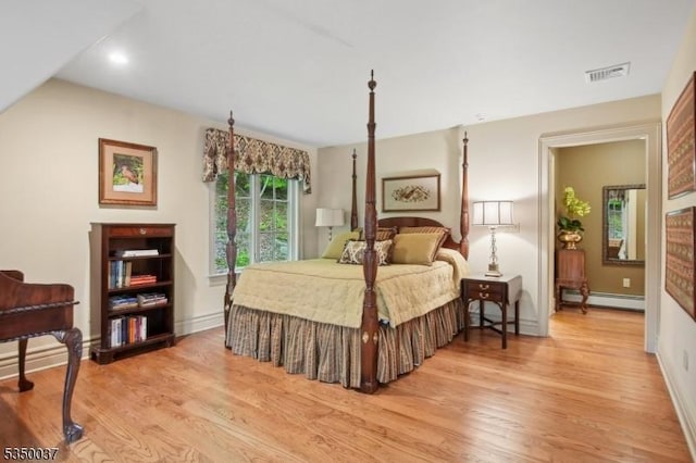 9 Valley View Dr, Lebanon Twp, NJ 07830 - bedroom with a baseboard heating unit, light wood-style flooring, baseboards, and recessed lighting