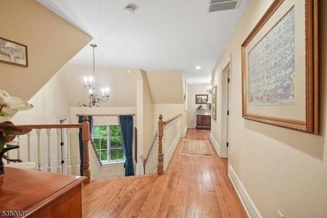 9 Valley View Dr, Lebanon Twp, NJ 07830 - hallway featuring an upstairs landing, light wood-style floors, a chandelier, baseboards, and recessed lighting