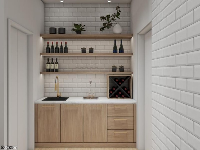 bar featuring a sink, decorative backsplash, recessed lighting, and wet bar