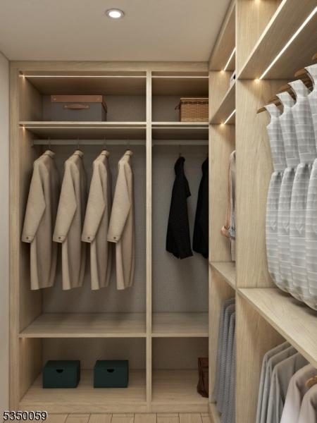 spacious closet featuring tile patterned flooring
