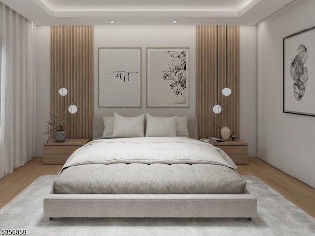 bedroom with wood finished floors