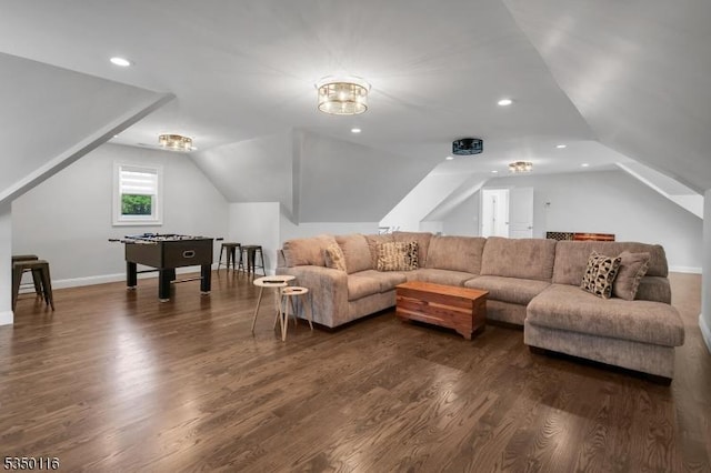 living room featuring dark wood-type flooring, recessed lighting, baseboards, and lofted ceiling