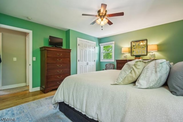 15 Longhill Rd, Randolph Twp, NJ 07869 - bedroom with wood finished floors, a closet, baseboards, and a ceiling fan