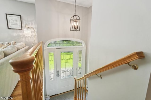 15 Longhill Rd, Randolph Twp, NJ 07869 - entrance foyer with a chandelier and stairs