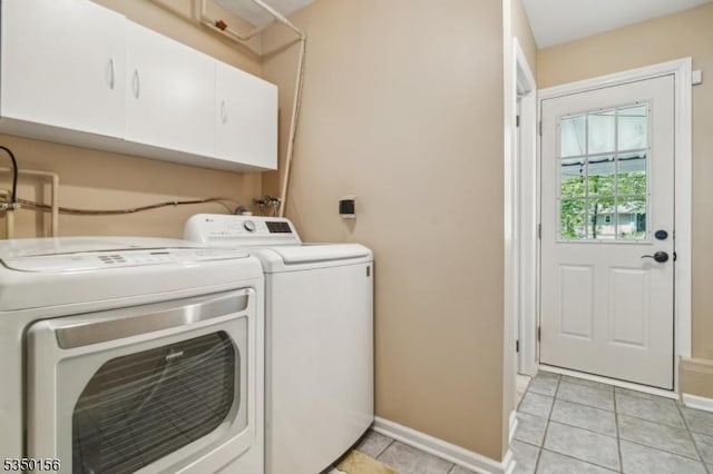 15 Longhill Rd, Randolph Twp, NJ 07869 - washroom with cabinet space, washing machine and clothes dryer, light tile patterned floors, and baseboards