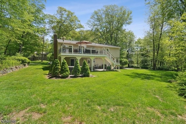15 Longhill Rd, Randolph Twp, NJ 07869 - rear view of property featuring stairs, a yard, a deck, and a chimney