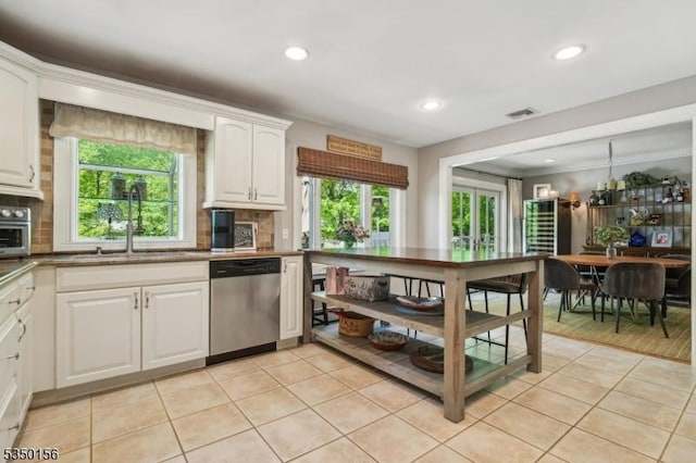 15 Longhill Rd, Randolph Twp, NJ 07869 - kitchen with dishwasher, white cabinetry, light tile patterned floors, tasteful backsplash, and recessed lighting