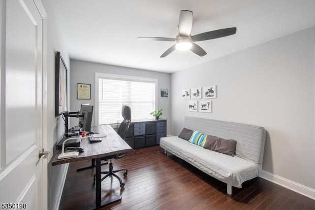 office space featuring dark wood-style flooring, baseboards, and a ceiling fan