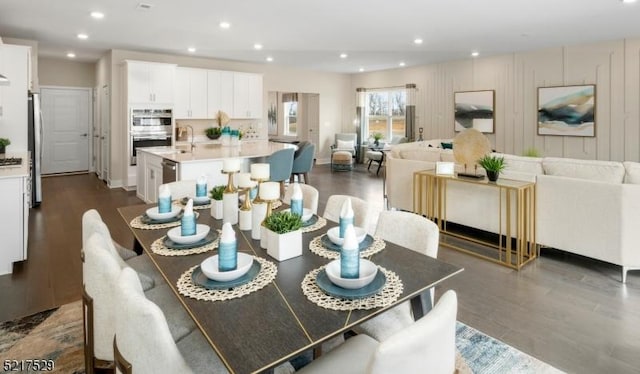 dining area with recessed lighting and dark wood-style floors