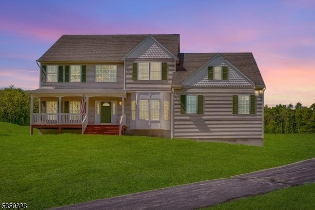 74 Rose Morrow Rd, Wantage Twp, NJ 07461 - view of front facade with a porch and a yard