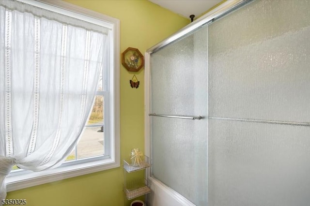 full bathroom with an enclosed shower