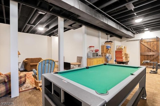 game room with carpet floors, billiards, and a barn door