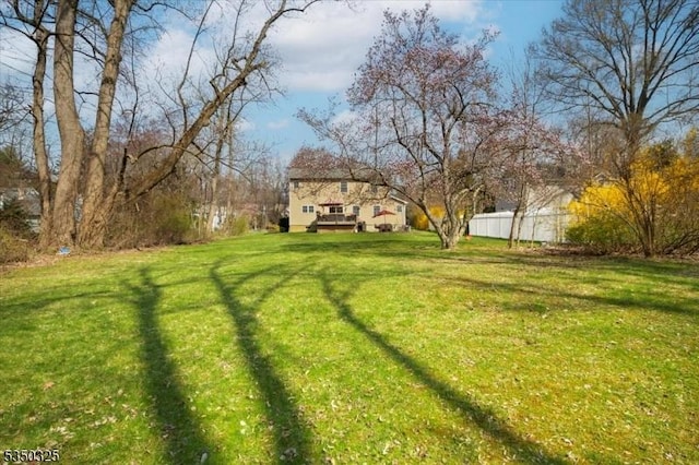 view of yard with fence