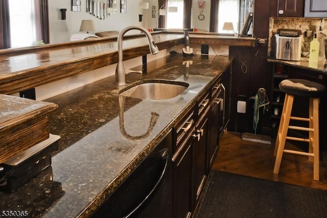 74 Longview Ave, Parsippany-Troy Hills Twp, NJ 07034 - kitchen with a sink, tasteful backsplash, and dark stone countertops
