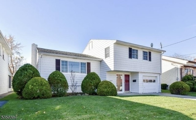 2462 Woodside Rd, Union Twp, NJ 07083 - split level home with a garage and a front yard