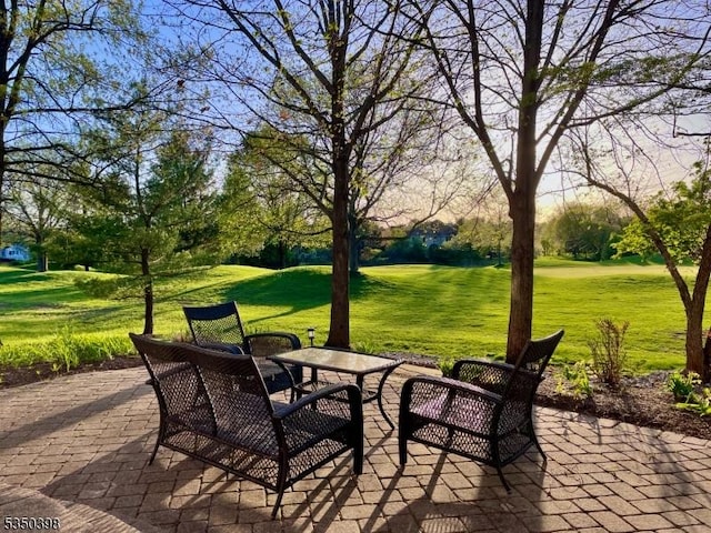 view of patio / terrace featuring view of scattered trees