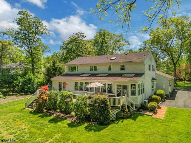 459 Ridge Rd, Watchung Boro, NJ 07069 - rear view of house with a yard, a wooden deck, and stairway