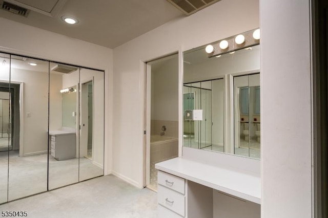 bathroom featuring baseboards, recessed lighting, and visible vents