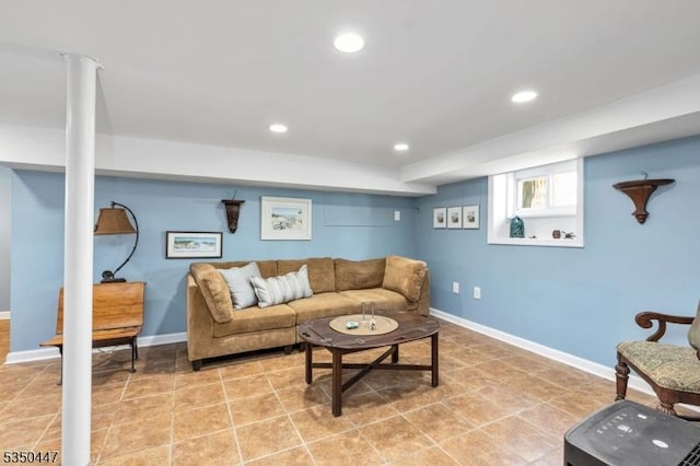 living area with recessed lighting and baseboards