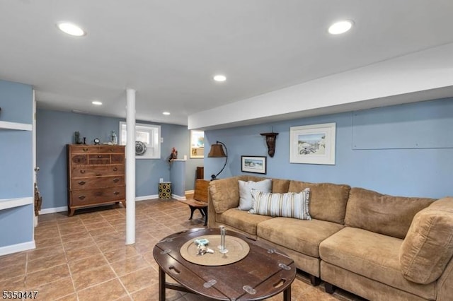 living area featuring light tile patterned floors, baseboards, and recessed lighting