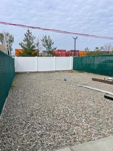 27 Edwin St, Carteret Boro, NJ 07008 - view of yard featuring fence