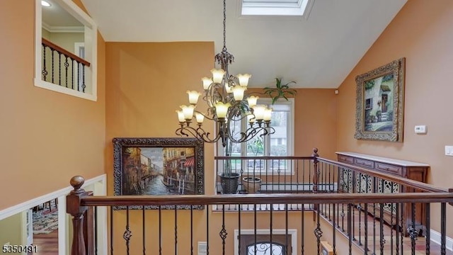 interior details featuring a chandelier