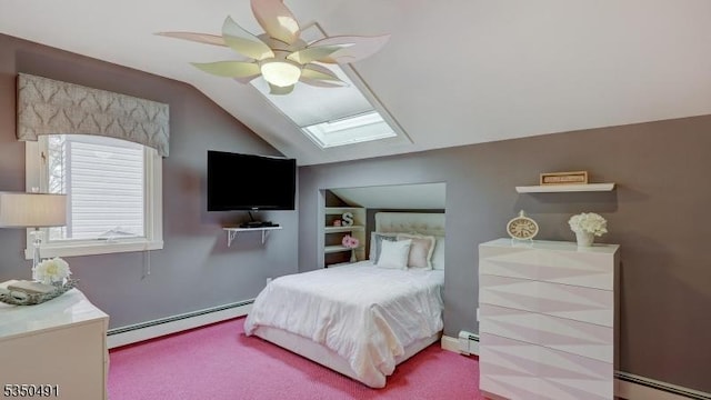 carpeted bedroom with a ceiling fan, a baseboard radiator, and vaulted ceiling with skylight