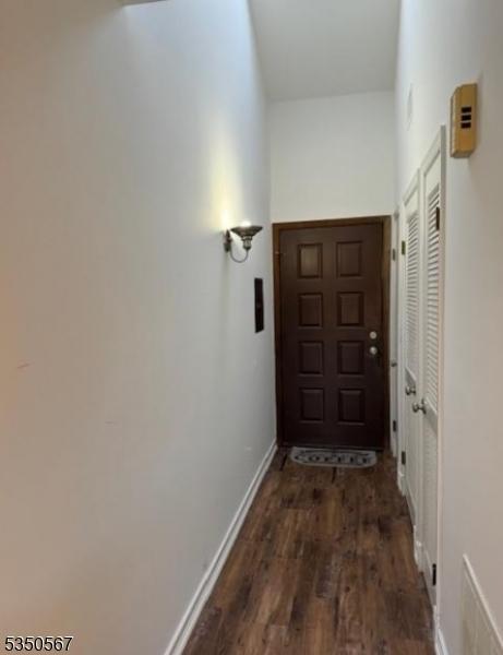 2 Alta Ct, Vernon Twp, NJ 07462 - hall with baseboards and wood finished floors