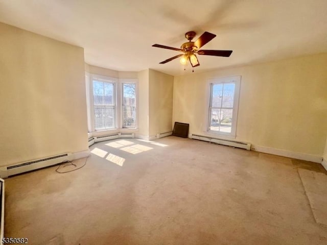 32 High St, Blairstown Twp, NJ 07825 - spare room with a baseboard heating unit, plenty of natural light, and a ceiling fan