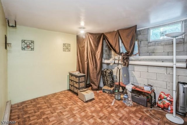 interior space featuring concrete block wall