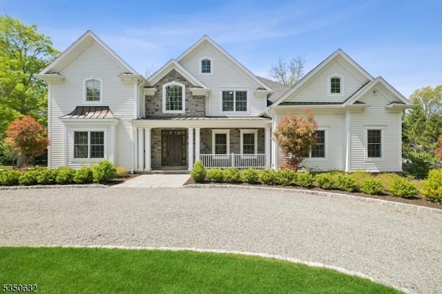 260 Hartshorn Dr, Millburn Twp, NJ 07078 - view of front of house featuring a porch and stone siding