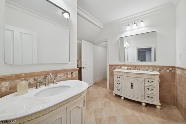 260 Hartshorn Dr, Millburn Twp, NJ 07078 - full bath featuring ornamental molding, two vanities, tile walls, and vaulted ceiling