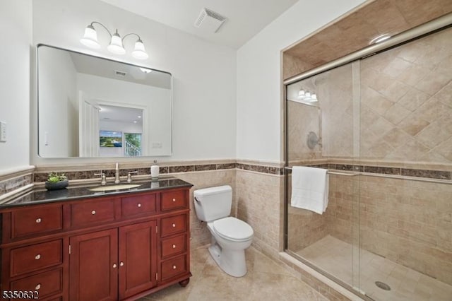 260 Hartshorn Dr, Millburn Twp, NJ 07078 - full bath with toilet, wainscoting, tile patterned flooring, tile walls, and a shower stall