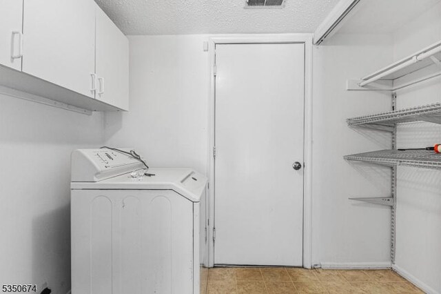 10 Brook St, Franklin Twp, NJ 08873 - laundry room with cabinet space, visible vents, and washer / clothes dryer