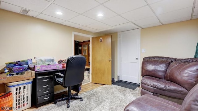 carpeted office space with recessed lighting, visible vents, and a paneled ceiling