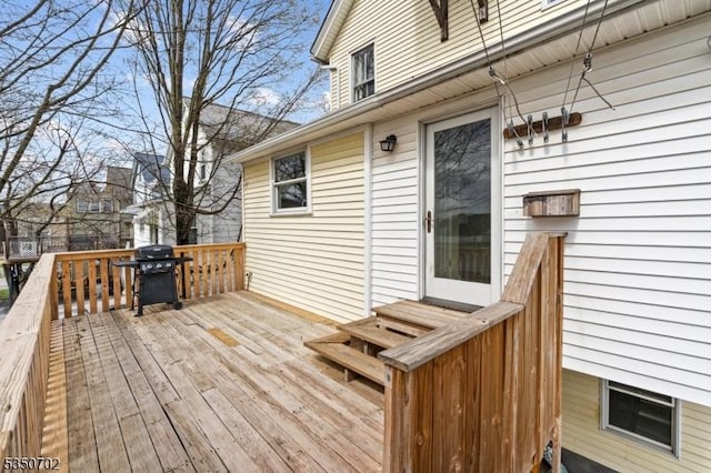 wooden terrace with grilling area