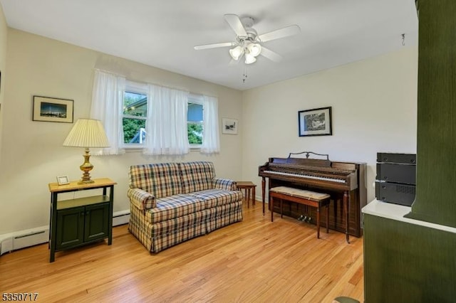 35 Clearview Dr, Randolph Twp, NJ 07869 - sitting room featuring light wood-type flooring, a baseboard heating unit, and a ceiling fan