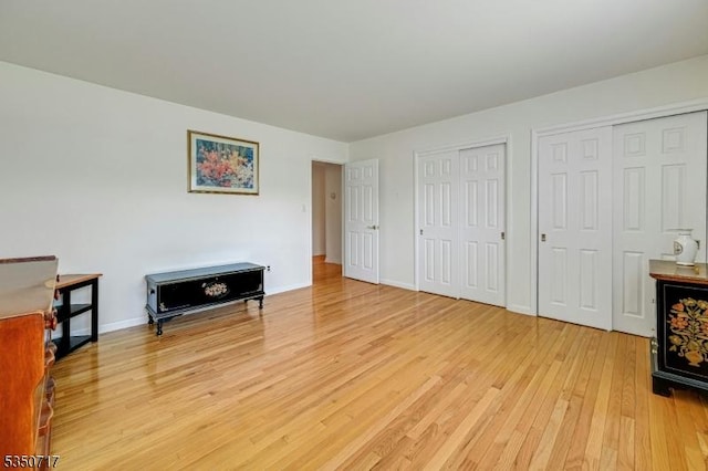 35 Clearview Dr, Randolph Twp, NJ 07869 - bedroom with light wood finished floors and multiple closets