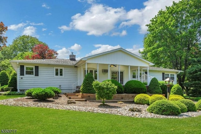 35 Clearview Dr, Randolph Twp, NJ 07869 - back of house with a lawn, a chimney, and a ceiling fan