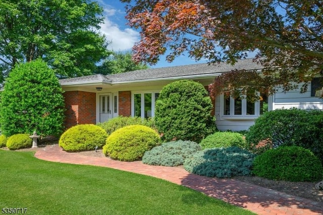 35 Clearview Dr, Randolph Twp, NJ 07869 - view of front of house with a front lawn and brick siding