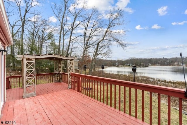 deck featuring a water view