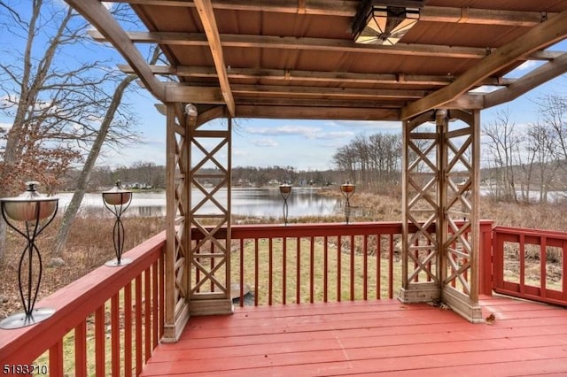 wooden deck with a water view