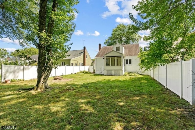 view of yard featuring a fenced backyard