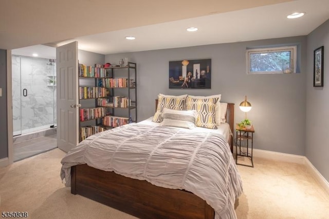 bedroom with recessed lighting, baseboards, carpet, and ensuite bath