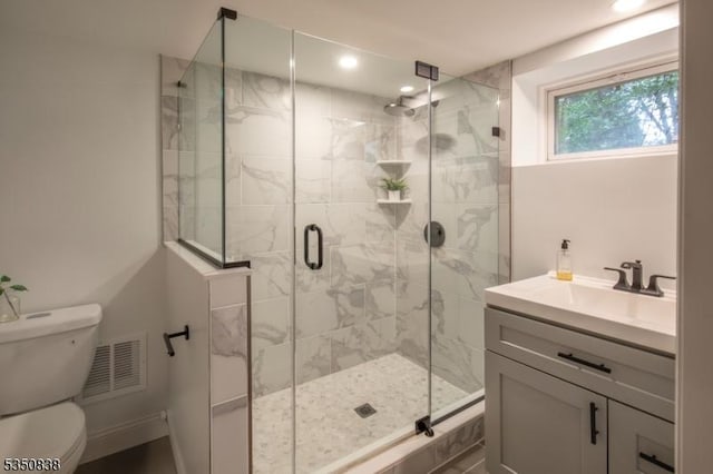 full bath with visible vents, vanity, toilet, recessed lighting, and a shower stall