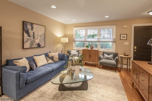 living room featuring recessed lighting and wood finished floors