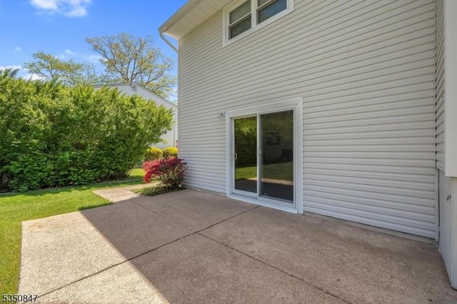 view of home's exterior featuring a patio